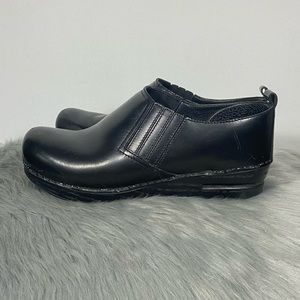 Dansko Piet Black Leather Clogs